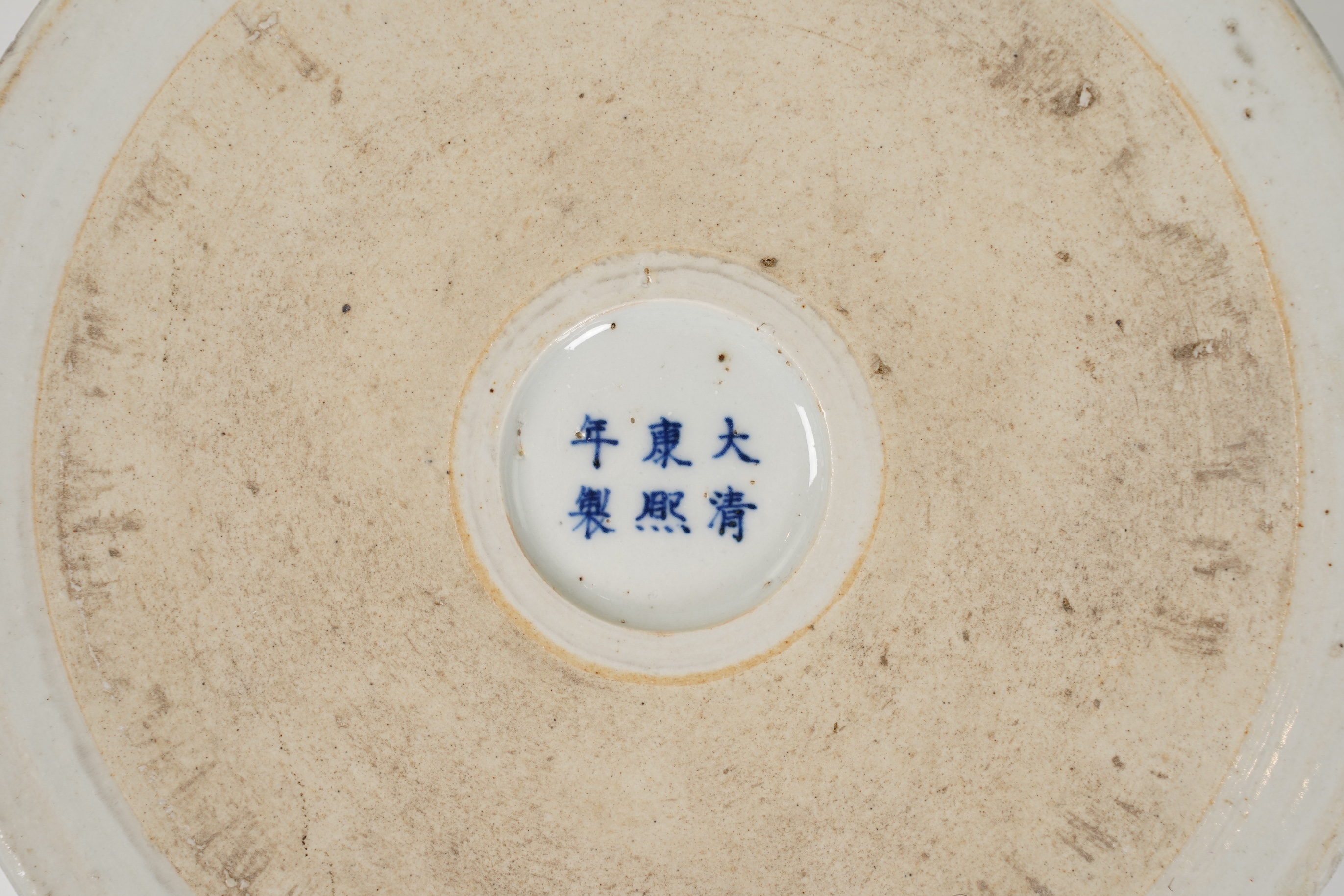 A Chinese underglaze blue and copper red inscribed brush pot, possibly Kangxi period